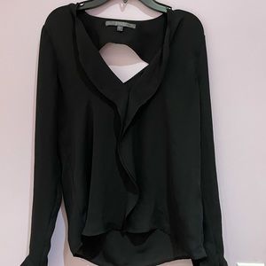 Guess sheer black long sleeve shirt with cutout in back. In perfect condition!